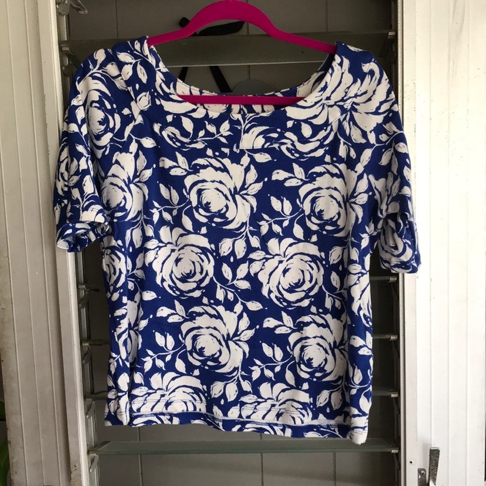 Blue and white floral boat neck top.